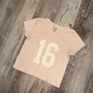 Brandy Melville John Galt baby pink cropped tshirt fits size xs-s